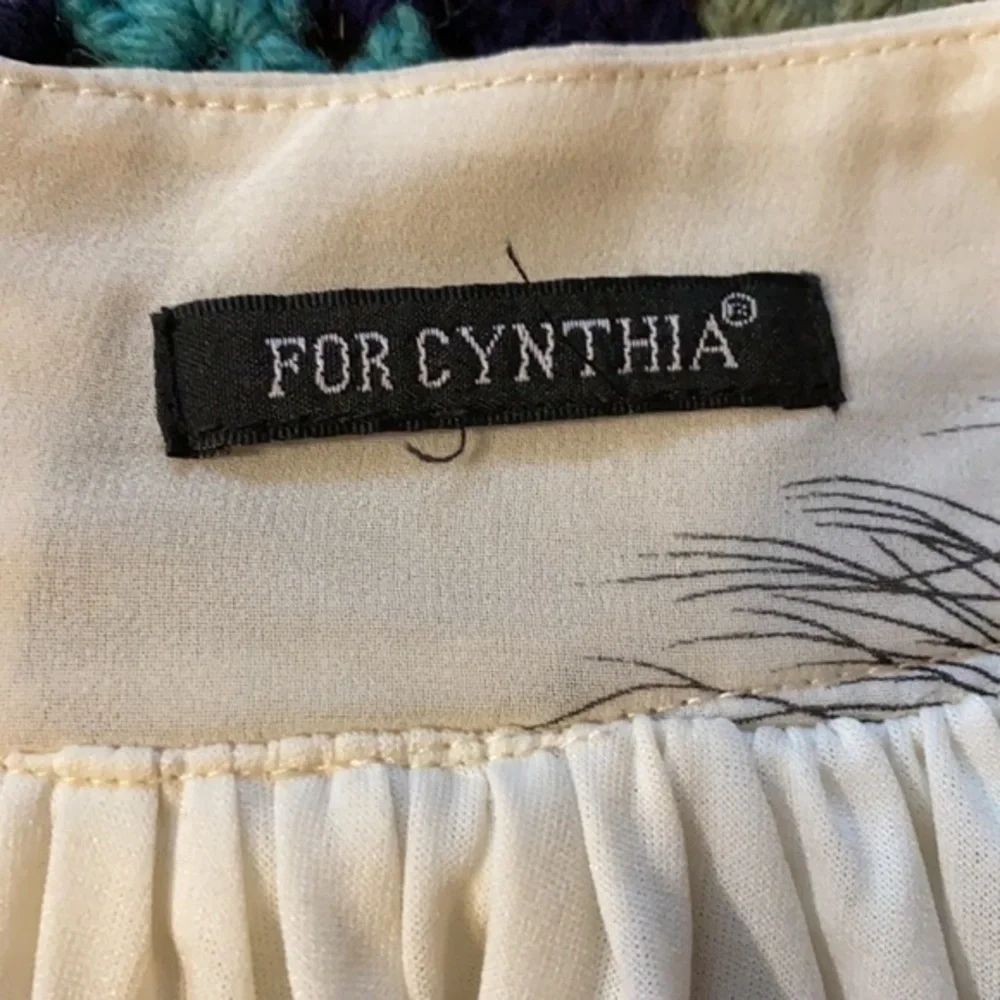 For Cynthia Ivory Feather Print Chiffon Pleated Mini Skirt